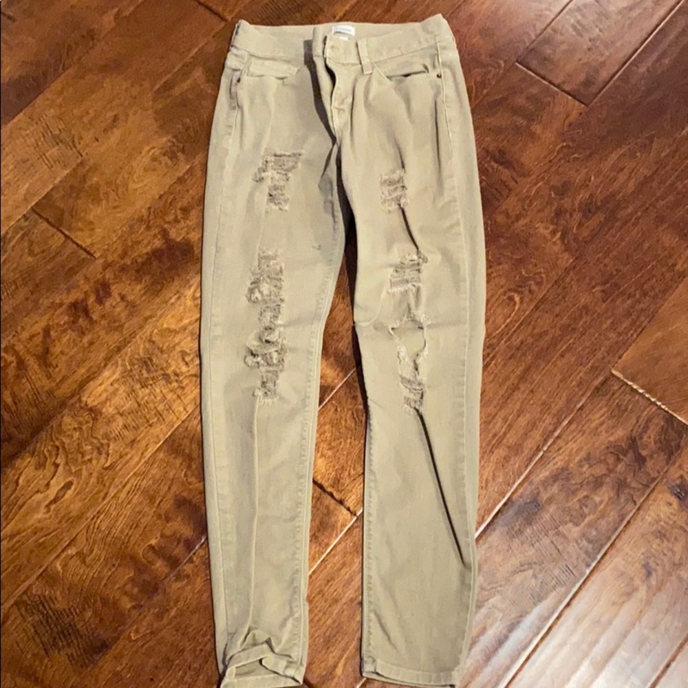 Tan distressed jeggings